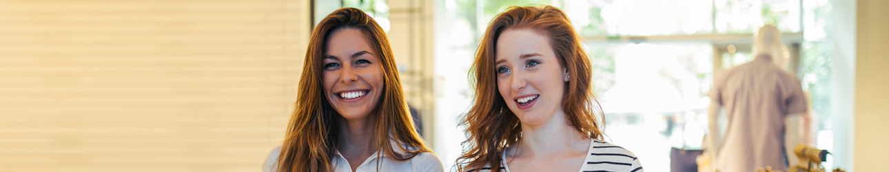 two female customers in a retail store