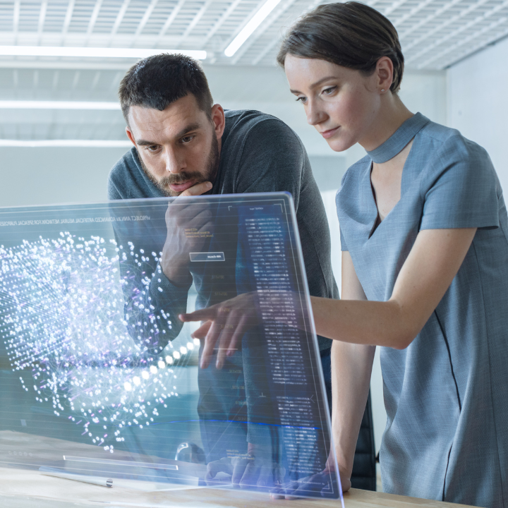 Man and woman looking at computer screen