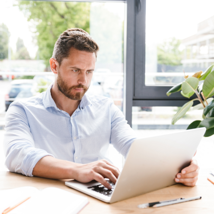 Man looking at a laptop